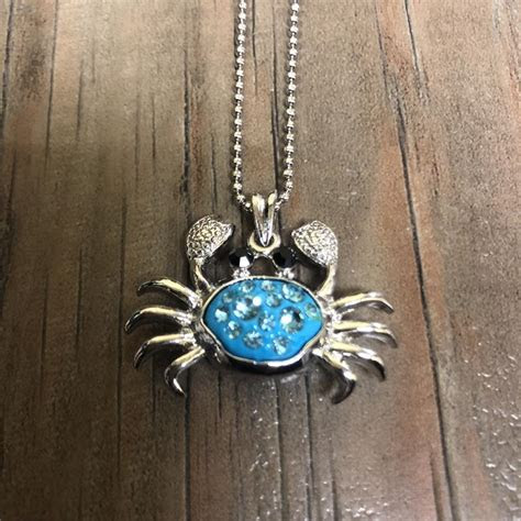 If you're not sure if what you're holding is precious or worthless, this information can help you find out. Colorful Fun Rhinestone Crab Necklace