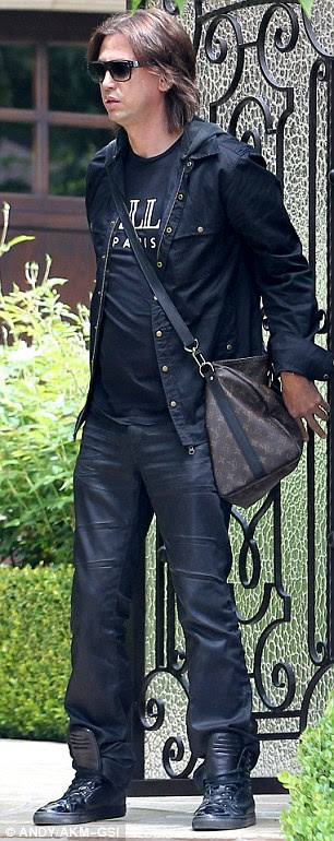 Moral support: Kim's best friend Jonathan Cheban was seen leaving her Beverly Hills residence on Saturday as Kim is said to have made her way to Cedars-Sinai hospital
