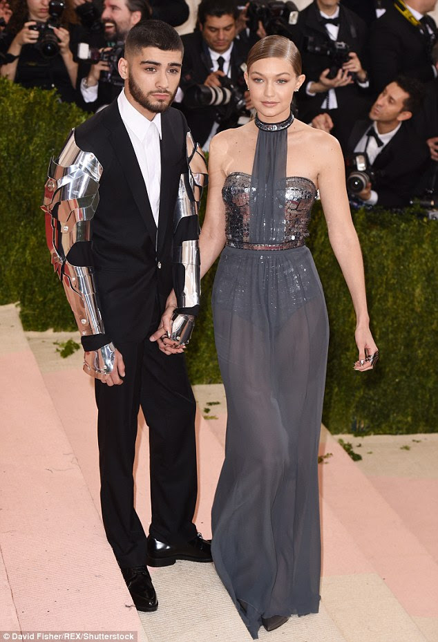 Split: Gigi Hadid and Zayn Malik have reportedly broken up. Above, the couple made their red carpet debut at the Met Costume Gala just last month