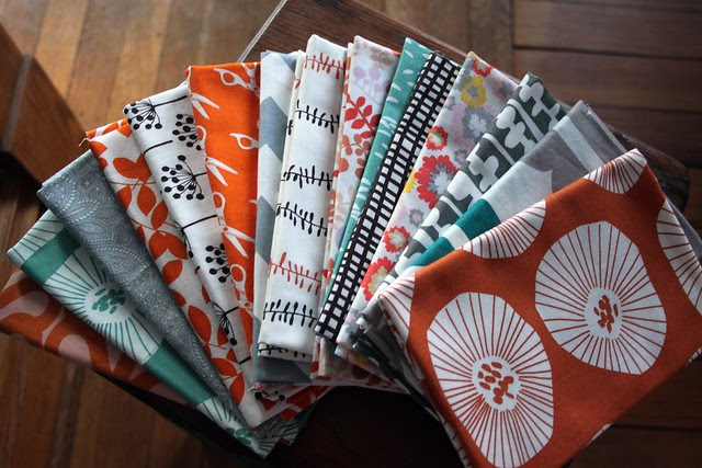 tangerine + grey + teal + black