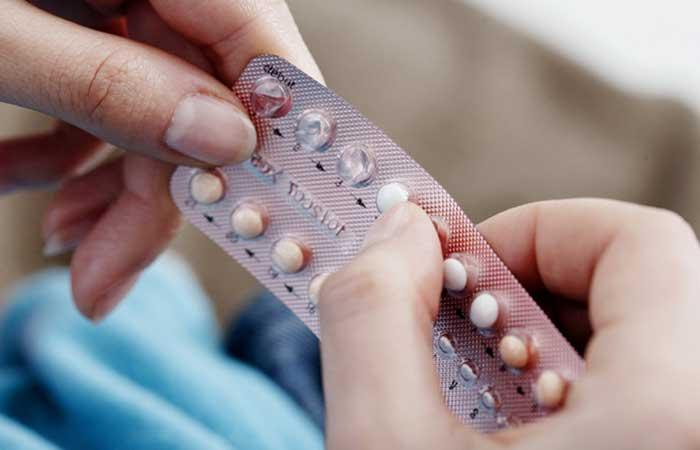 10.-Taking-A-Pill-To-Stop-Period