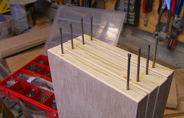 Nails to support shelves for finishing