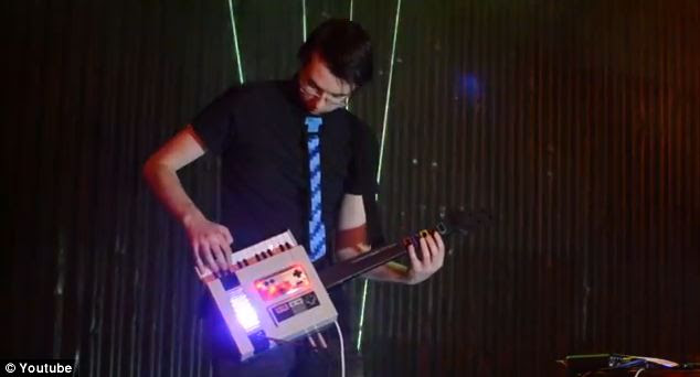 Software Engineer Greig Stewart from Glasgow has revealed his amazing NES Keytar invention (pictured). Using an old Nintendo console, a Guitar Hero controller and keys, the inventor has been able to coax out sounds from a chip in the old console and make it recreate popular music such as the Game of Thrones theme tune