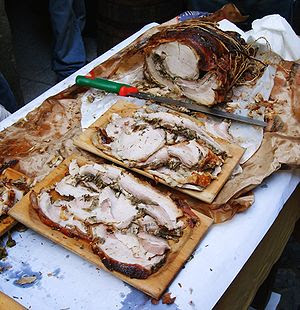 It shows a Porchetta, both integer and cut in ...