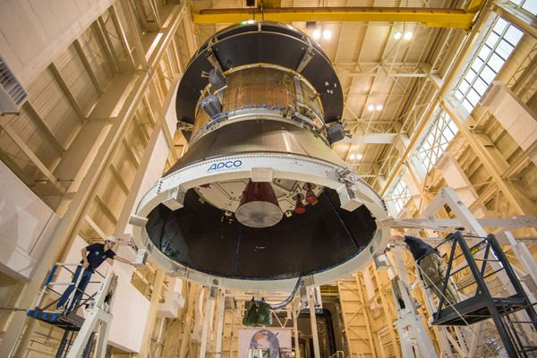 At NASA Glenn's Plum Brook Station in Sandusky, Ohio, engineers work on a test version of the Orion spacecraft's service module...on February 20, 2016.