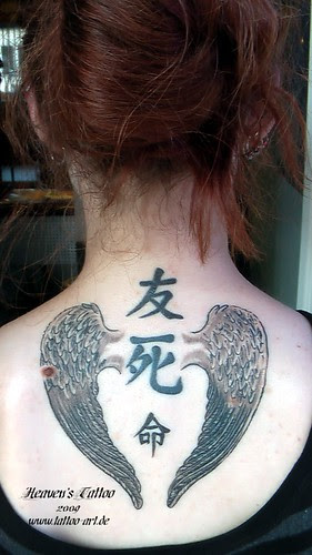 Beautiful girl with hinder tattoo angel 