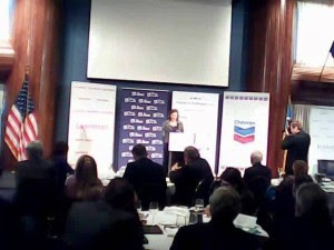 A screen shot of U.S. Assistant Secretary of State for European Affairs Victoria Nuland speaking to U.S. and Ukrainian business leaders on Dec. 13, 2013, at an event sponsored by Chevron, with its logo to Nuland’s left.