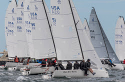 J/70s sailing off starting line