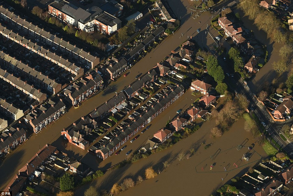 Huntingdon Road and Yearsley Crescent are covered by floodwater in York after the Rivers Ouse and River Foss overspilled