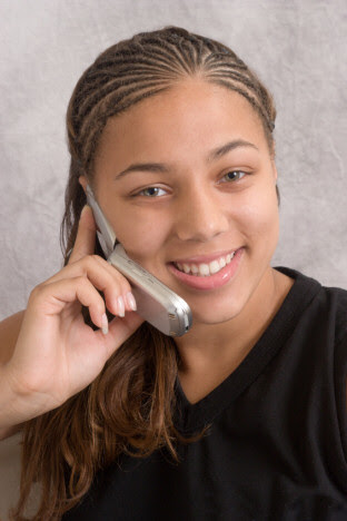 Our model wears a versatile style with cornrows ending in long, 