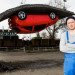 Alex Chinneck, gravity-defying artwork, art installation, ‘Pick yourself up and pull yourself together,’ Vauxhall Motors, Vauxhall Corsa, illusory artwork, tarmac, temporary art,