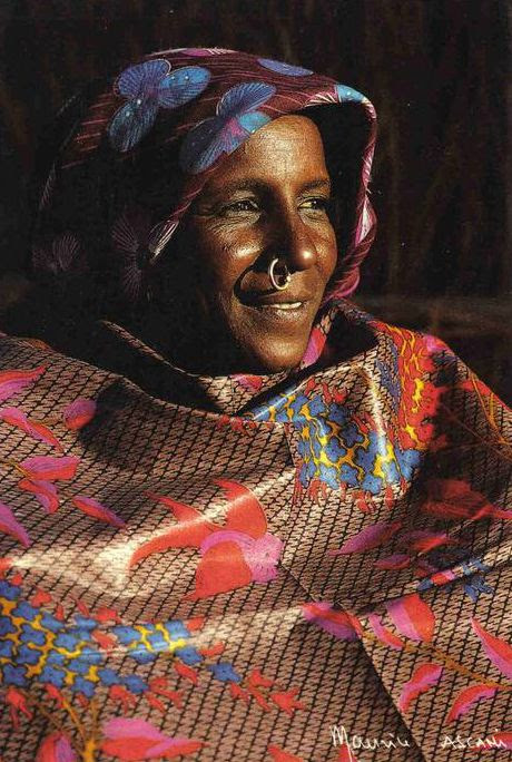 Africa | Toubou woman from Kaouar.  Niger | Scanned postcard; photo by Maurice Ascani, published by CFAO, Niamey, 1988