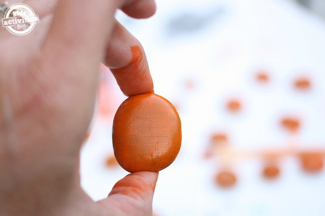 Painting pumpkin rocks