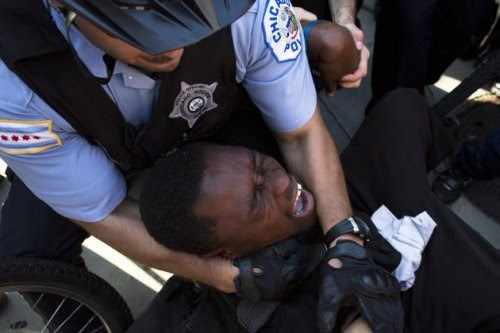 And it begins. This image shows a NATO protester being arrested in Chicago .. Outright crackdown on protesters is set to begin by police, who have been warning for months that security was going to be tight. Reports a few days back on local Chicago news indicated that a no fly zone will be in effect in Chicago for the duration of the NATO meeting. A large demonstration in set for Chicago today.. police vs. protesters Match 1 set to begin some time during the next several hours.. An AP report illustrates the amount of tension that is already existent between both sides in Chicago. And meanwhile, when the NATO summit begins, world leaders will be dealing with a potential breakup of the EU, war, and all that happy go lucky stuff&#8230; Readers in Chicago: Keep in touch with me about what is going on. It&#8217;s going to be a long summit for many..