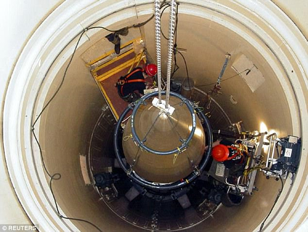 No salted bomb has ever been tested, and according to public records none have ever been built. It takes its name from the phrase 'to salt the earth', meaning to render soil unable to host life. Pictured are US engineers working on a nuclear warhead within an ICBM in 2014