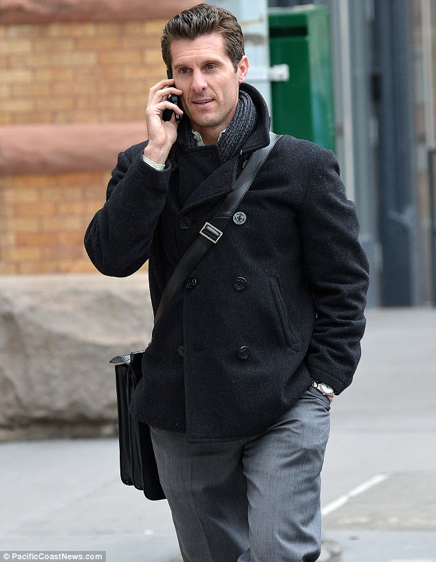 Keeping up communication: He was spotted taking a phone call at one point possibly from his estranged wife