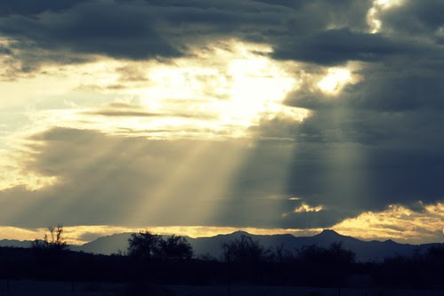 God's fingers shining through