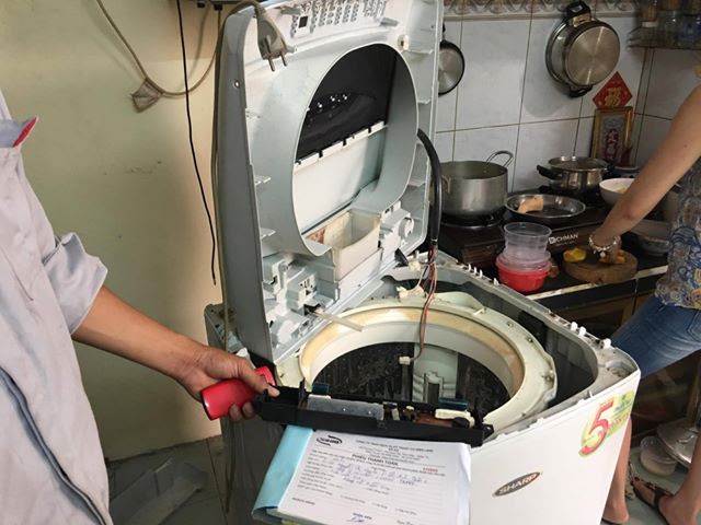 sua-may-giat-quan-4