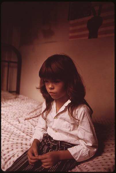 File:DIANE WATKINS, 9, IN BEDROOM OF HER FAMILY'S HOUSE IN MULKY SQUARE. DIANE IS ONE OF THE NINE CHILDREN OF A BISCUIT... - NARA - 553532.jpg