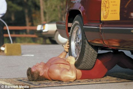 Here's an ab workout that won't catch on. Strongman Tom Owen lets a truck packed with 20 kids