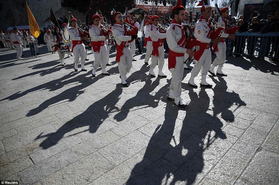 Musical: A Palestinian marching band performs during a Christmas procession at Manger Square