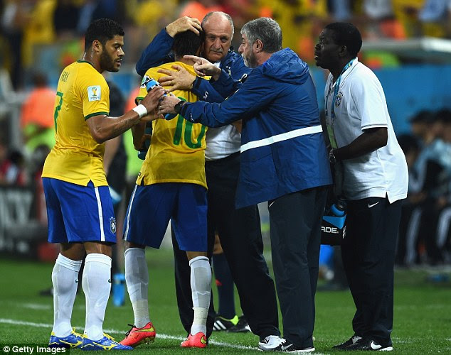 A big hug from Big Phil: Luiz Felipe Scolari embraces Neymar following his equaliser for Brazil