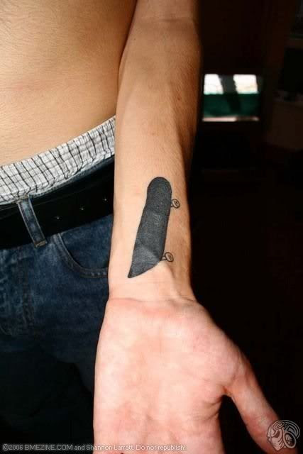 skateboard tattoo .