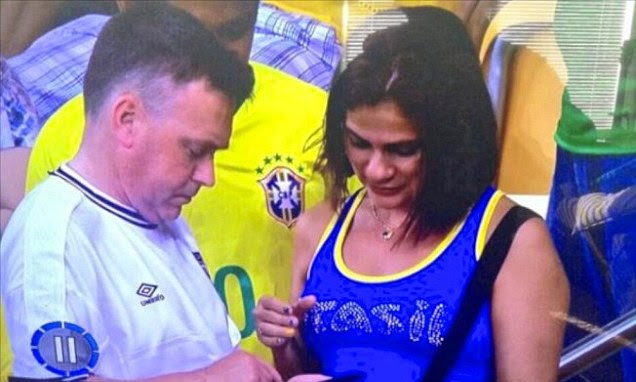 Rumbled: Carl Wenz was seen by millions of TV viewers chatting to a Brazilian woman on Saturday