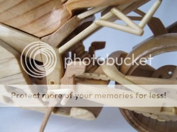 http://i1127.photobucket.com/albums/l624/jexgill/Bikes%20Made%20Out%20Of%20Wood/411.jpg