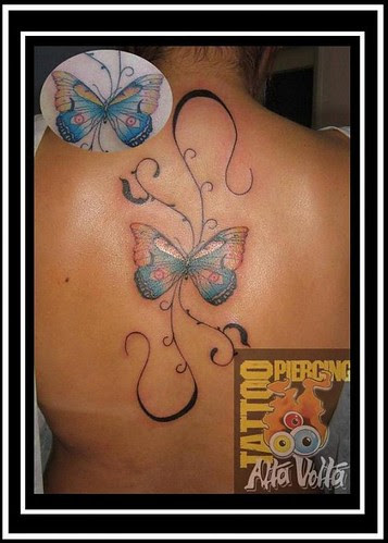 Tattoo is butterfly girl back  