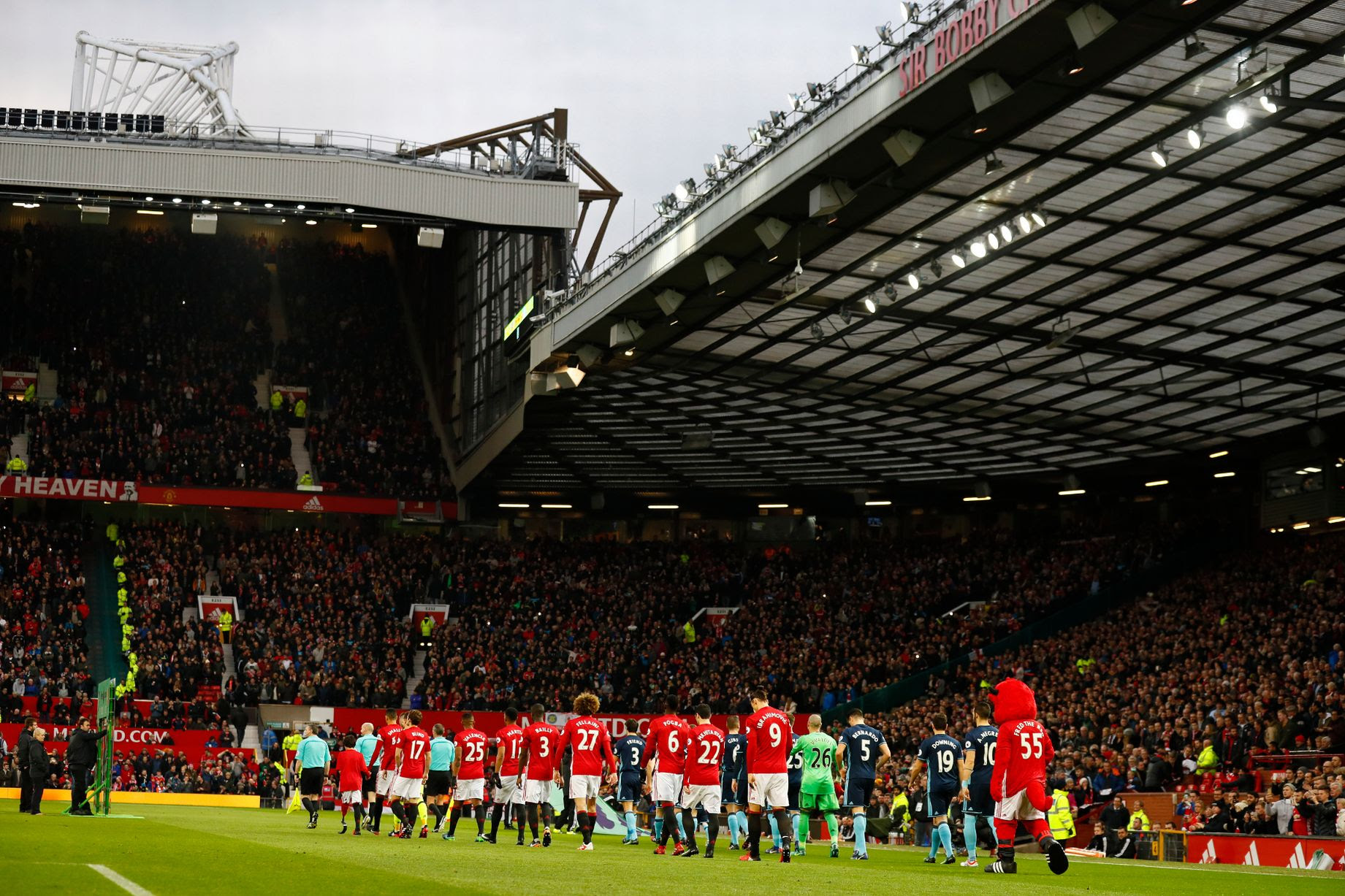 Manchester United and Middlesbrough players walk out onto the pitch before the game
