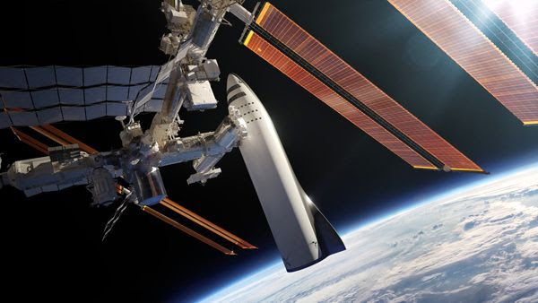 An artist's concept of SpaceX's BFR docked to the International Space Station.