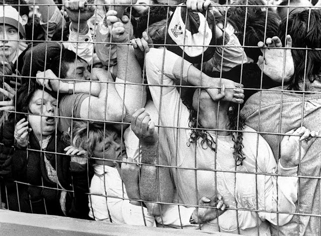 When the gates were opened, thousands of fans entered a narrow tunnel leading to the rear of the terrace into two overcrowded central pens, creating pressure at the front.