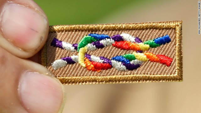  A member of Scouts for Equality holds an unofficial knot patch incorporating the colors of the rainbow, a symbol for gay rights.