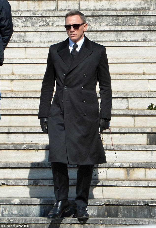 Scary: Daniel Craig, who plays James Bond in the forthcoming Spectre, was injured behind the wheel during a high-speed car chase through the streets of Rome