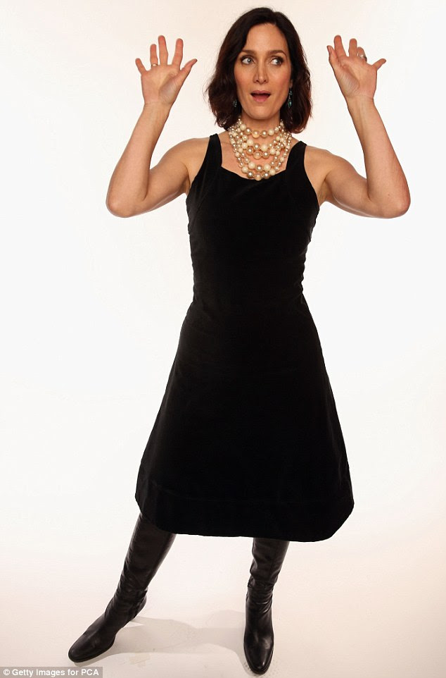 Oh please! The Matrix star Carrie-Ann Moss hammed it up for the cameras 
