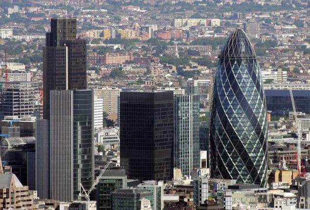 The Gherkin (right) is owned by a German investment fund Tower 42 (left) looks like it's about to be snapped up by a South African magnate