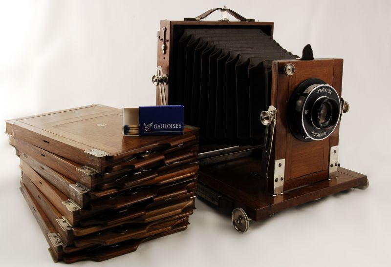 It doesn't have plane filme holders - only for glass negatives.
