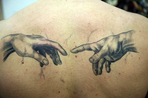 Grey Hands Tattoo by The Tattoo Studio