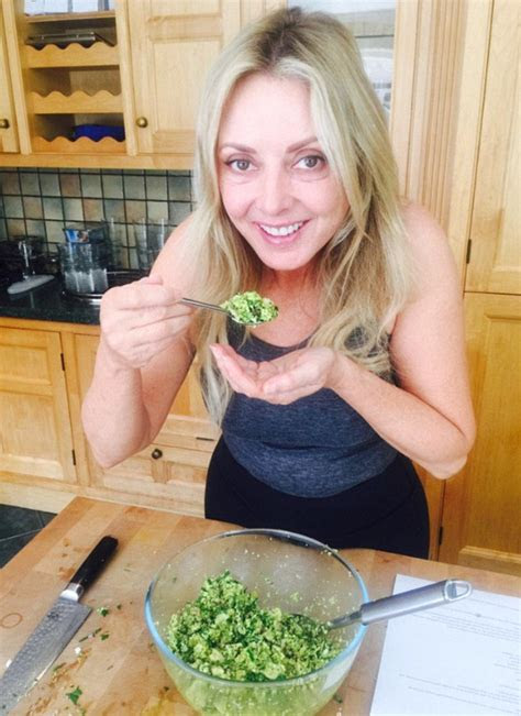 carol vorderman puts    busty display  gym selfie