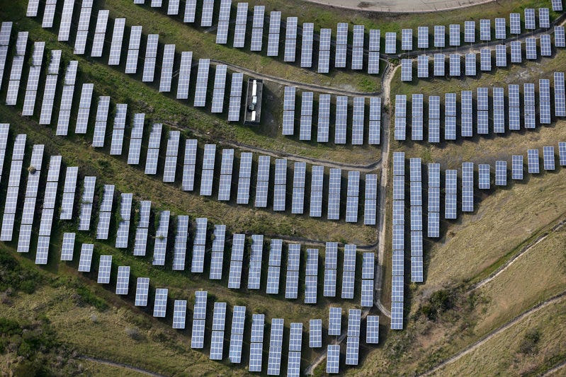 FILE PHOTO - An array of solar panels are seen in Oakland, California, U.S. on December 4, 2016. REUTERS/Lucy Nicholson/File Photo