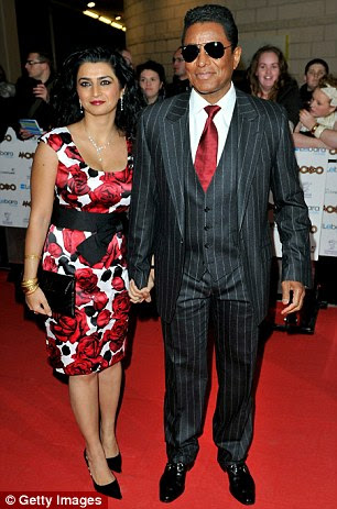 Let's party: DJ Trevor Nelson presents Billy Ocean with a Lifetime Achievement Award (left), while award presenter Jermaine Jackson arrives at the ceremony with wife Halima