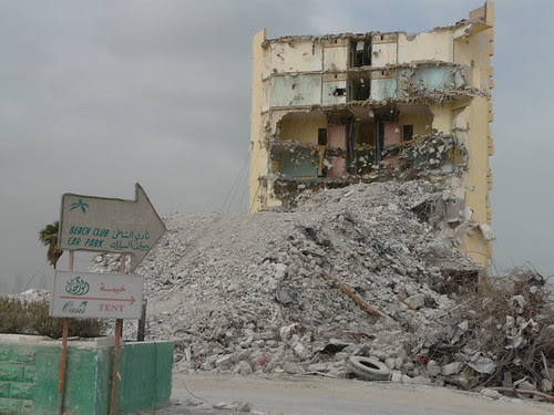 The inside rooms of the Oasis hotel are laid bare before for the final remains are knocked flat.