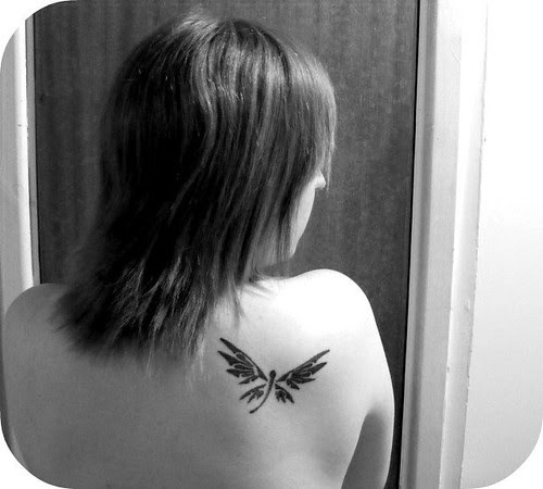 Dragonfly Tattoo Upper Back. For a lady who wants to look tough with a 