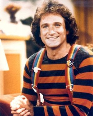 Robin Williams as Mork