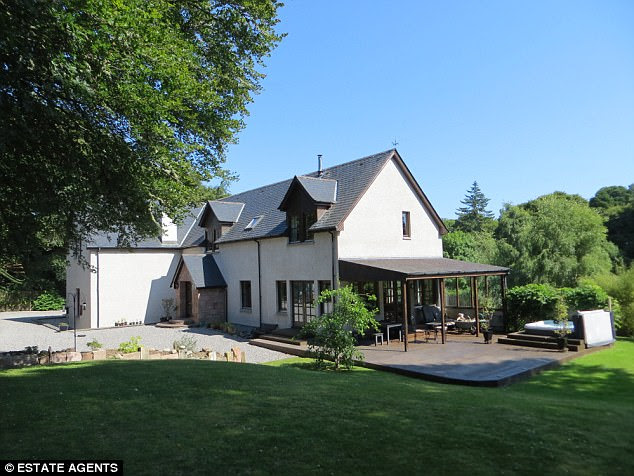 Warm welcome: Fuel your woodburners with logs from your own 2.5 acres of mature woodland, in this detatched four-bedroom house, near Loch Ness