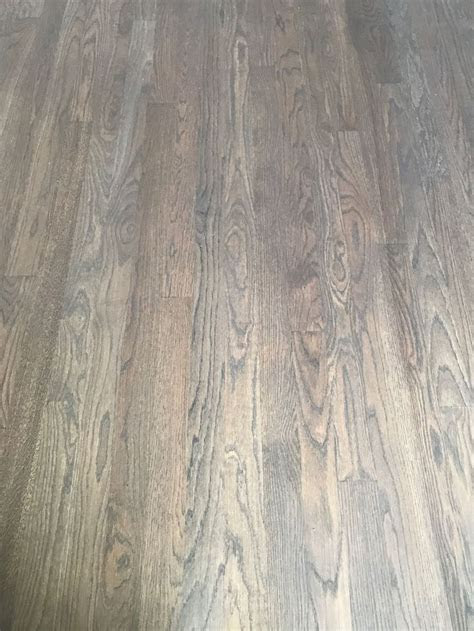Deciding whether to refinish or replace the wood floor in your home? 50/50 Minwax Classic Gray and Jacobean (no poly yet