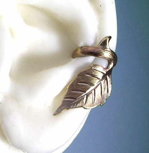EAR CUFF.  No piercing required. Rose leaf with thorn design, Gloden Antique finish.