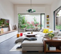 The photos in this post focus on the rear addition to the house, which includes three levels, beginning with this open and sunny living area.