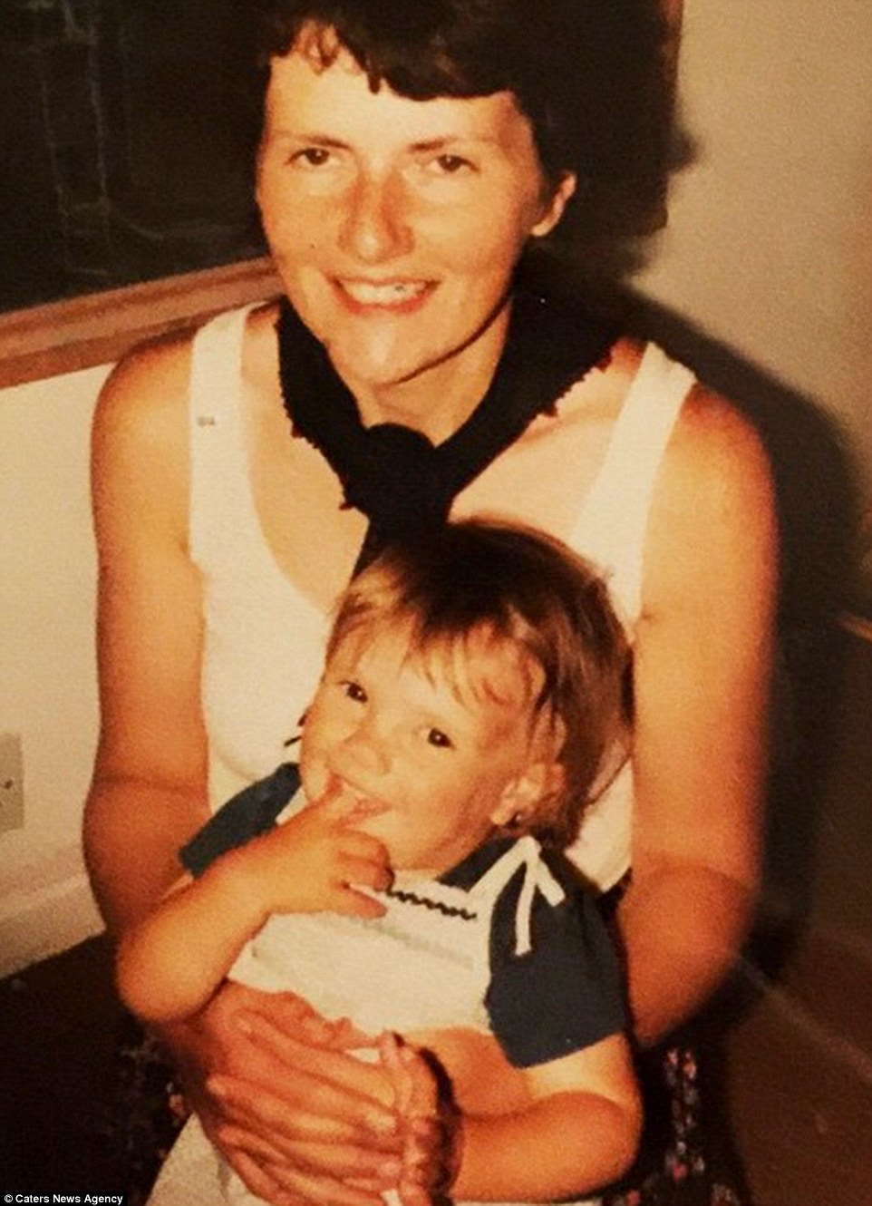 Bereft: 18-month-old Claira pictured on her mother Jane's lap. She later lost her mother to cancer, which consumed her with grief